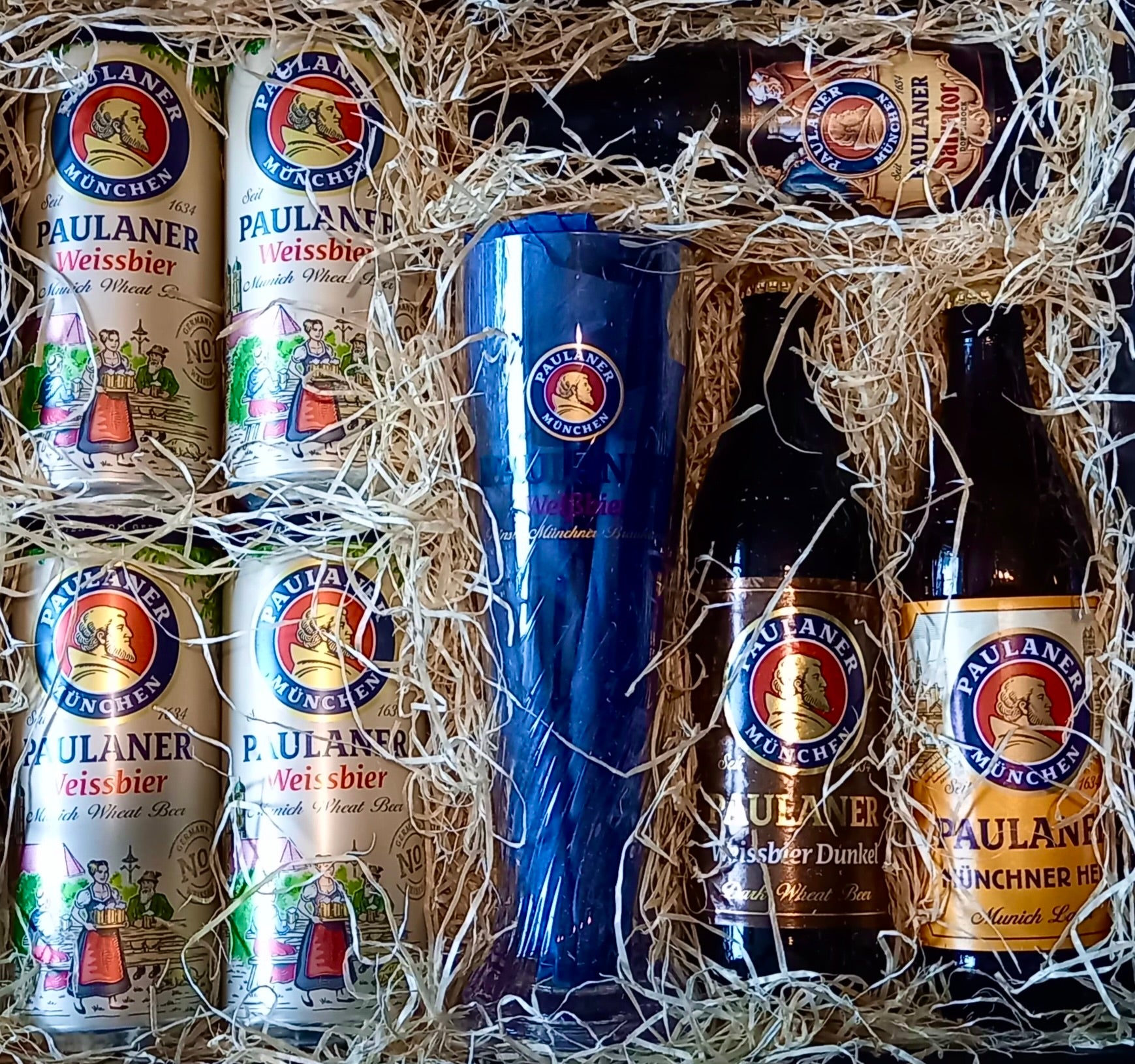 selection of paulaner beers and paulaner glass