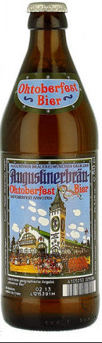 A bottle of Augustiner Oktoberfest Bier with a label showing a colorful illustration of a German town and the brewery.
